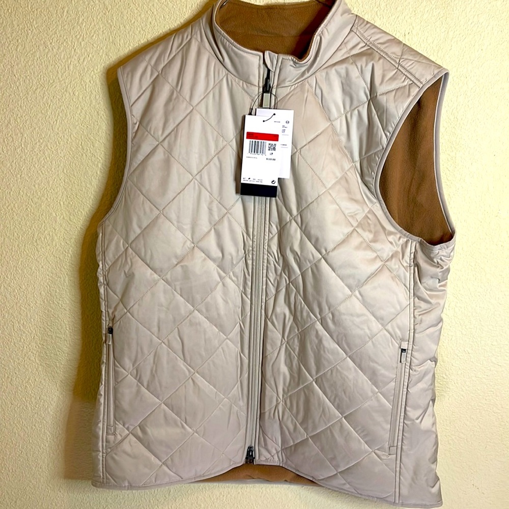 Tan Size L quilted Nike vest with fleece lining. NWT